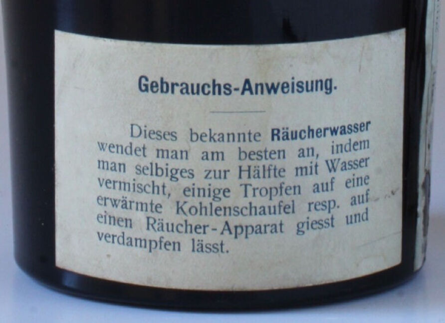 Rückseite der Flasche mit der Gebrauchs-Anweisung, vor 1914